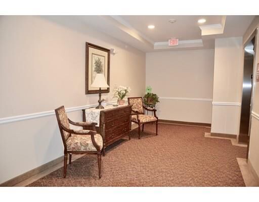 Property Photo: 107 Clocktower Dr 405 MA 02452