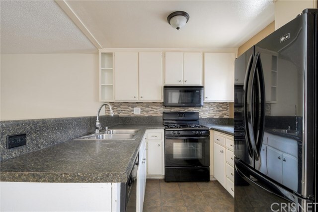 Property Photo:  18530 Hatteras Street 123  CA 91356 