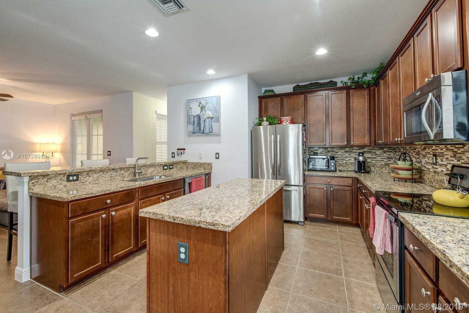 Property Photo: 14745 SW 13th St FL 33027