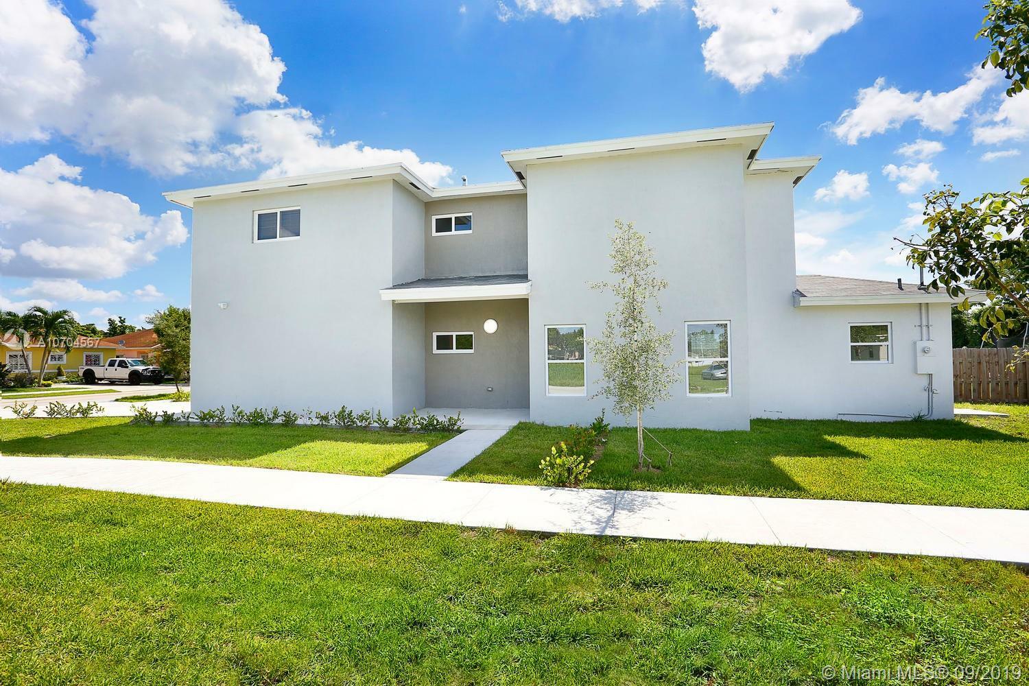 Property Photo:  12190 SW 221 St  FL 33170 