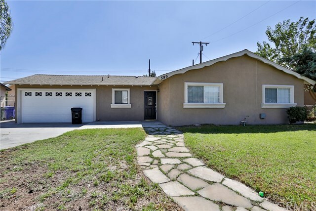 Property Photo:  599 W Pomona Street  CA 92376 