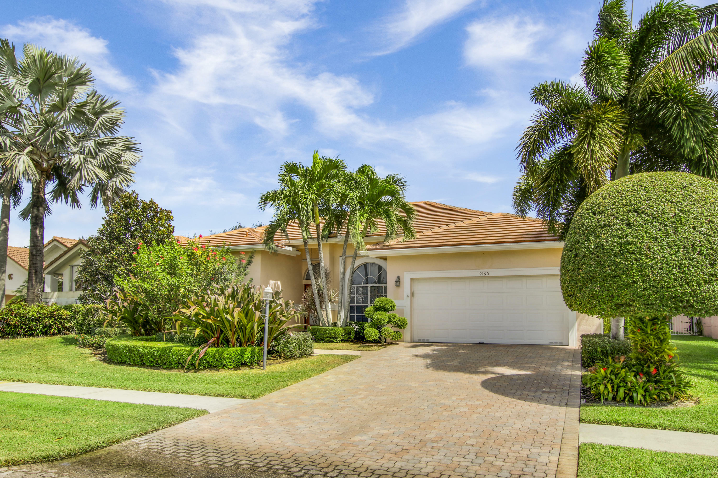 Property Photo:  9160 Cypress Hollow Drive  FL 33418 