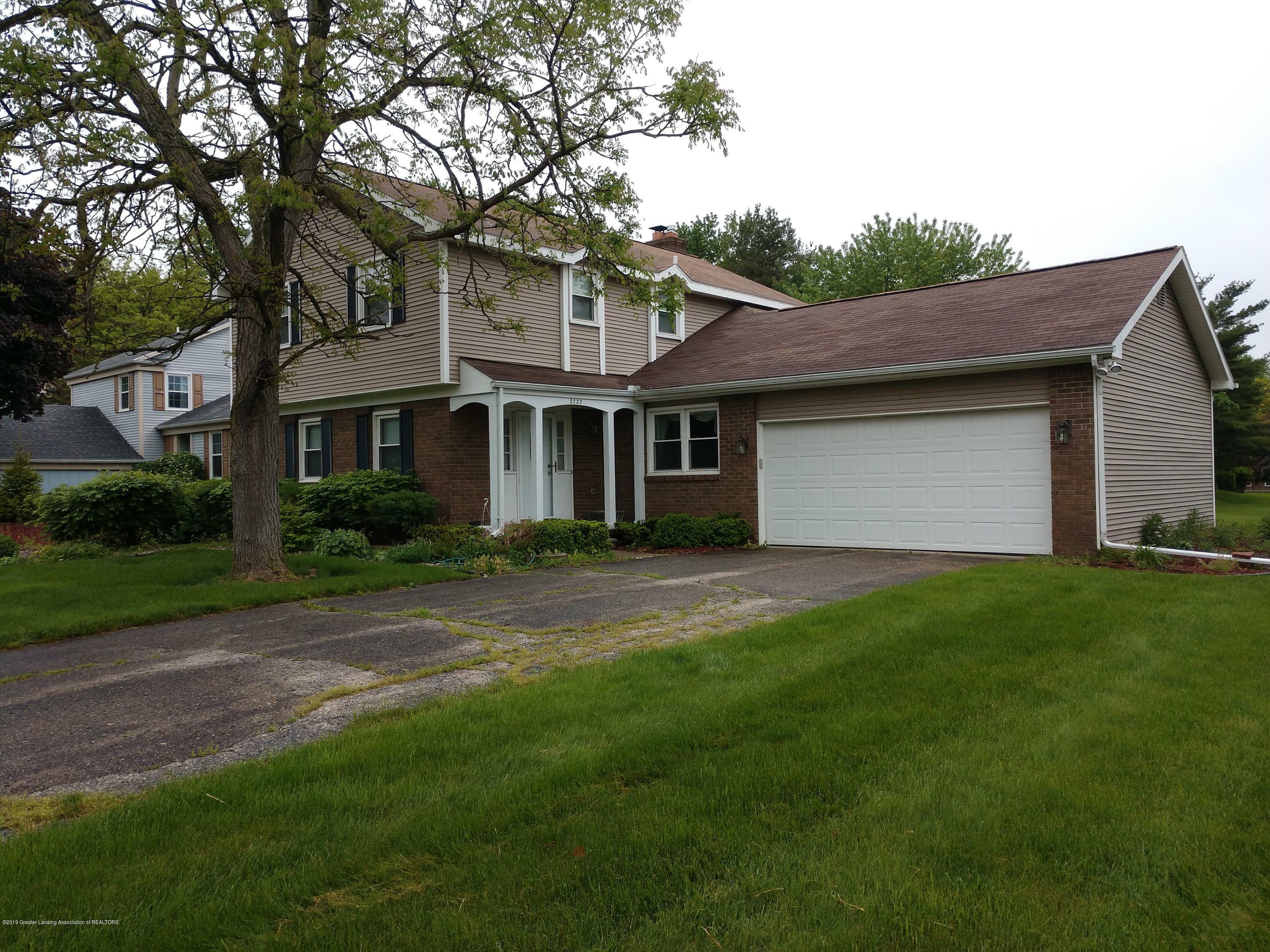 Property Photo:  2222 Piney Point Drive  MI 48917 