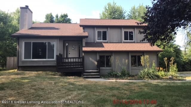 Property Photo:  5980 Arvida Drive  MI 48911 