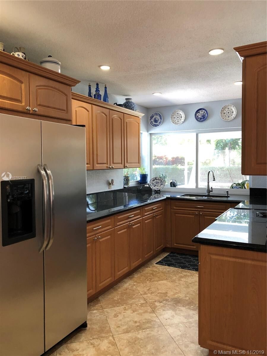 Property Photo: 7050 SW 8th St FL 33317