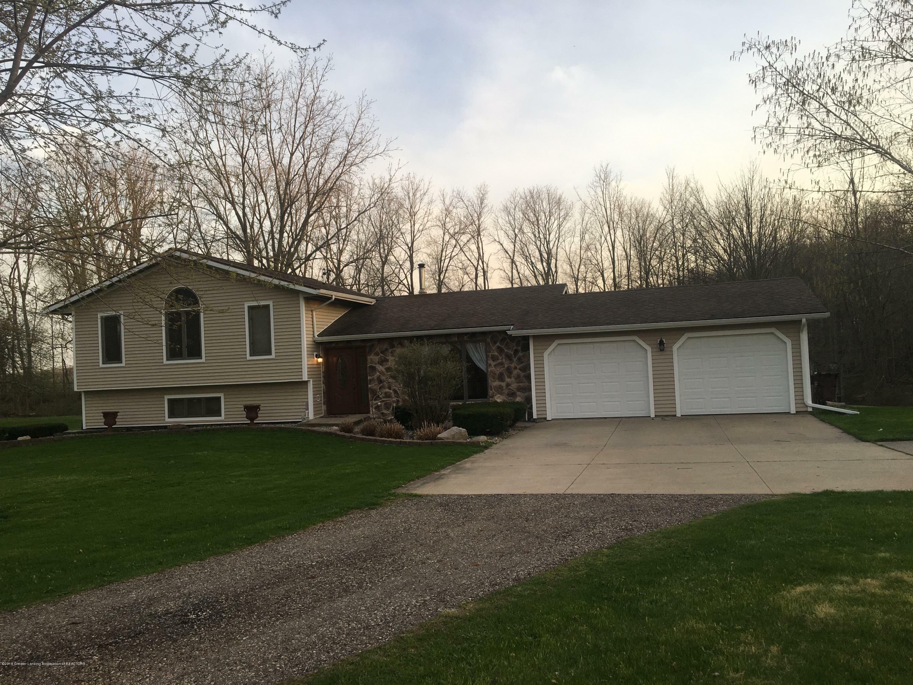 Property Photo:  7205 W Mount Hope Highway  MI 48861 