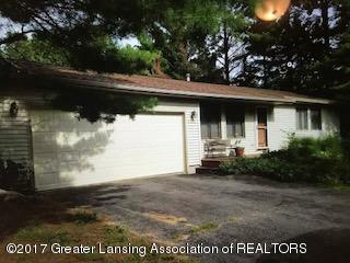 Property Photo:  6422 Towar Avenue  MI 48823 