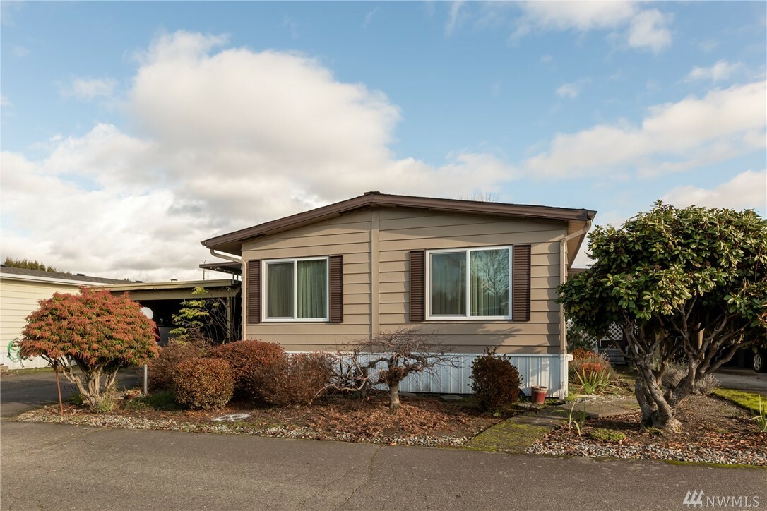 Property Photo: 3127 40th Av Ct E 9 WA 98443