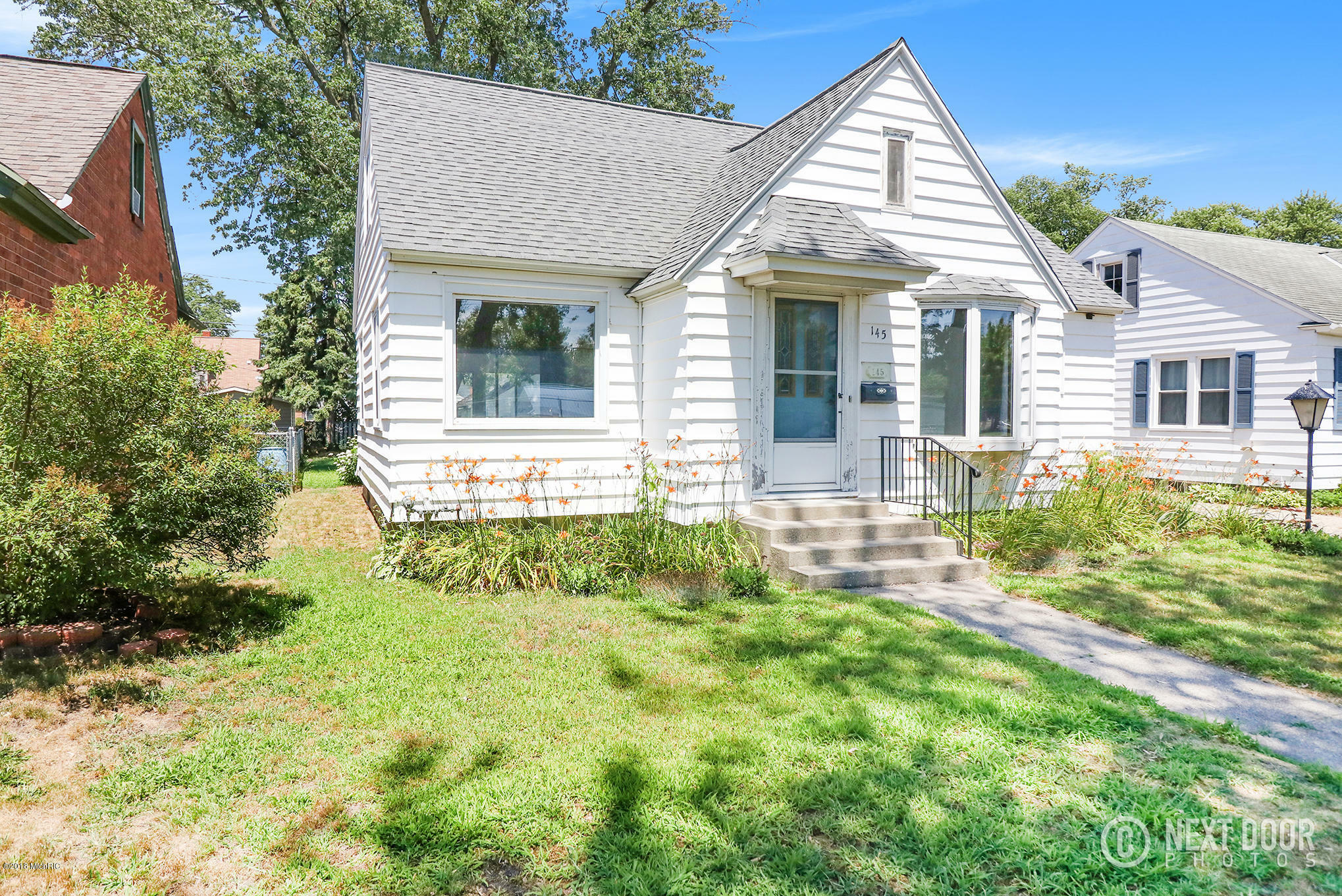 Property Photo:  145 W 21st Street  MI 49423 