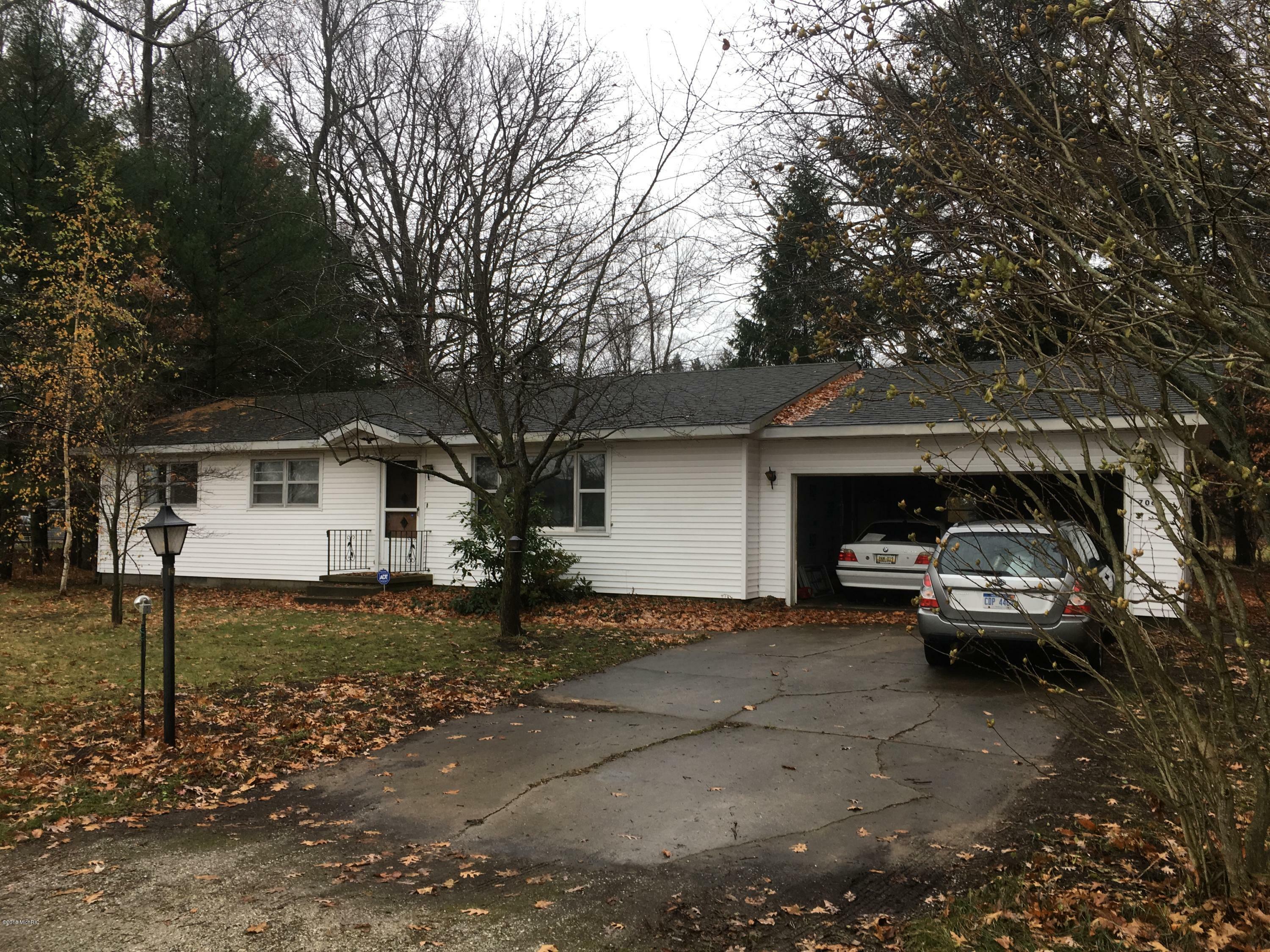 Property Photo:  7065 Post Road  MI 49437 