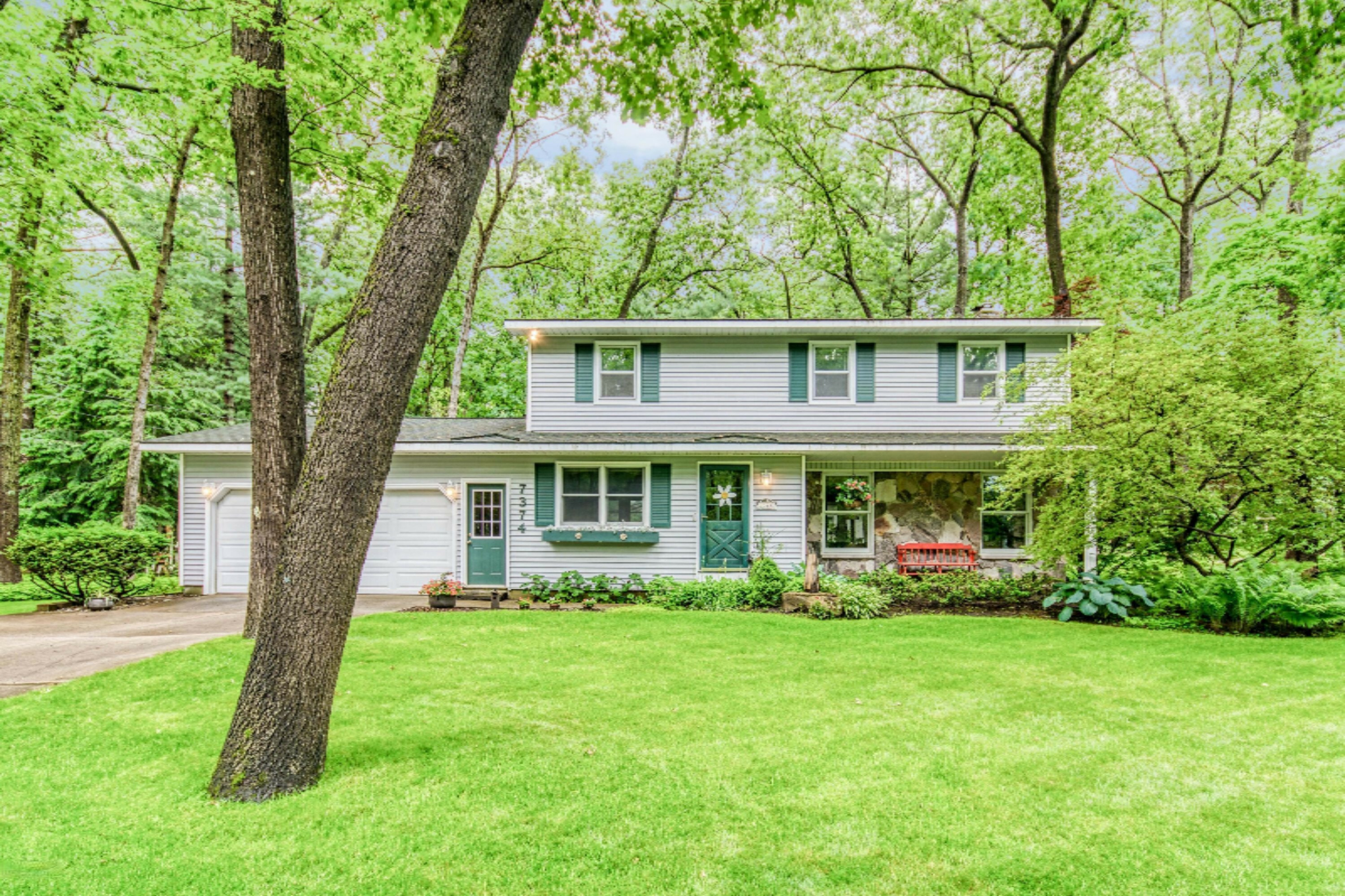 Property Photo:  7374 Sheffield Drive SE  MI 49301 