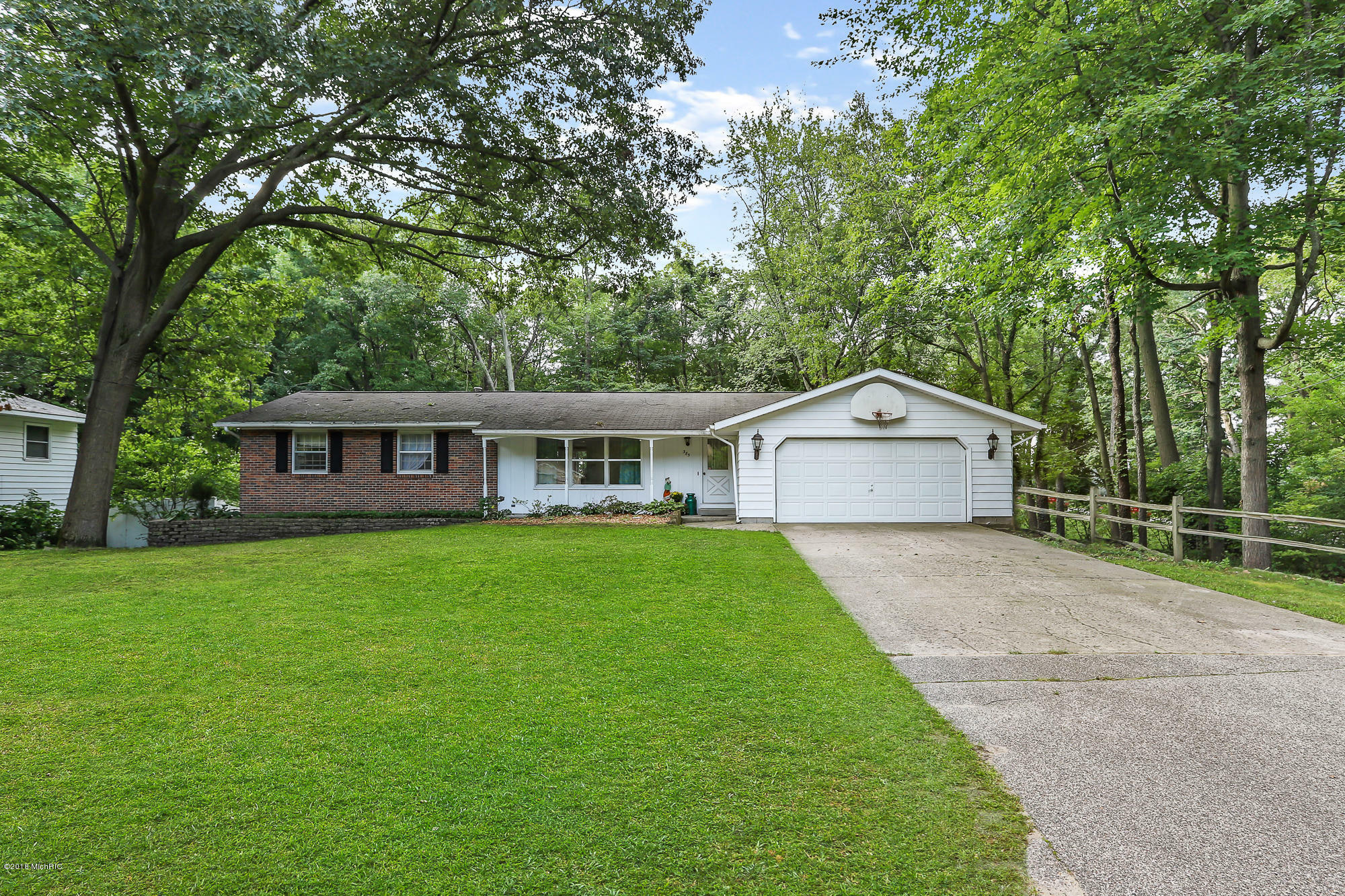 Property Photo:  385 Greenwood Drive  MI 49424 