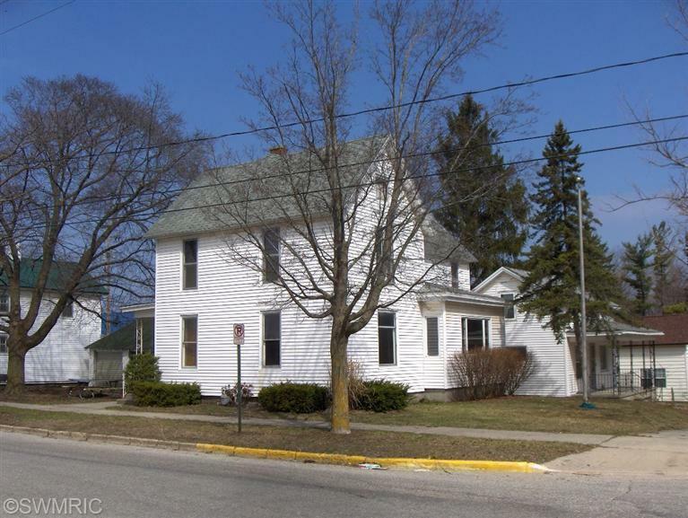 Property Photo:  301 N Warren Avenue  MI 49307 