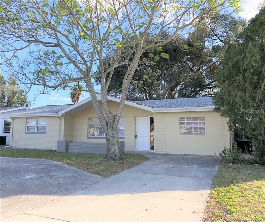 Property Photo:  7534 Camelot Rd  FL 34668 