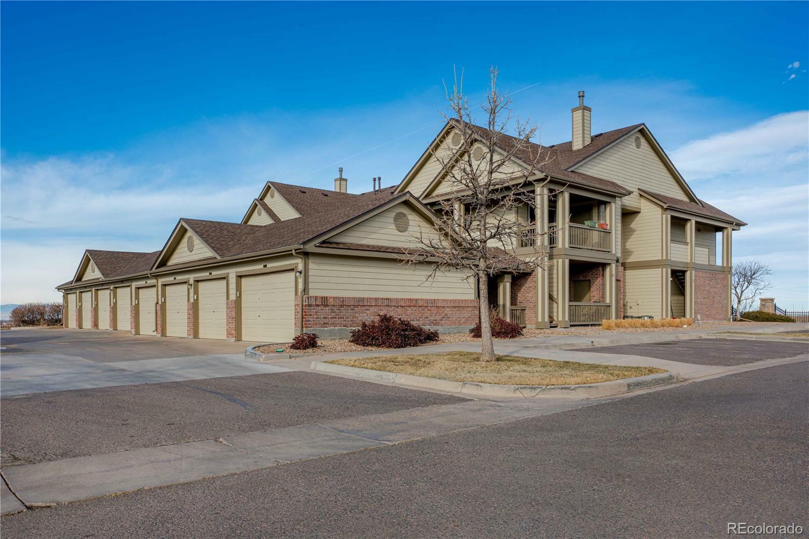 Property Photo: 23306 E 5th Place 104 CO 80018