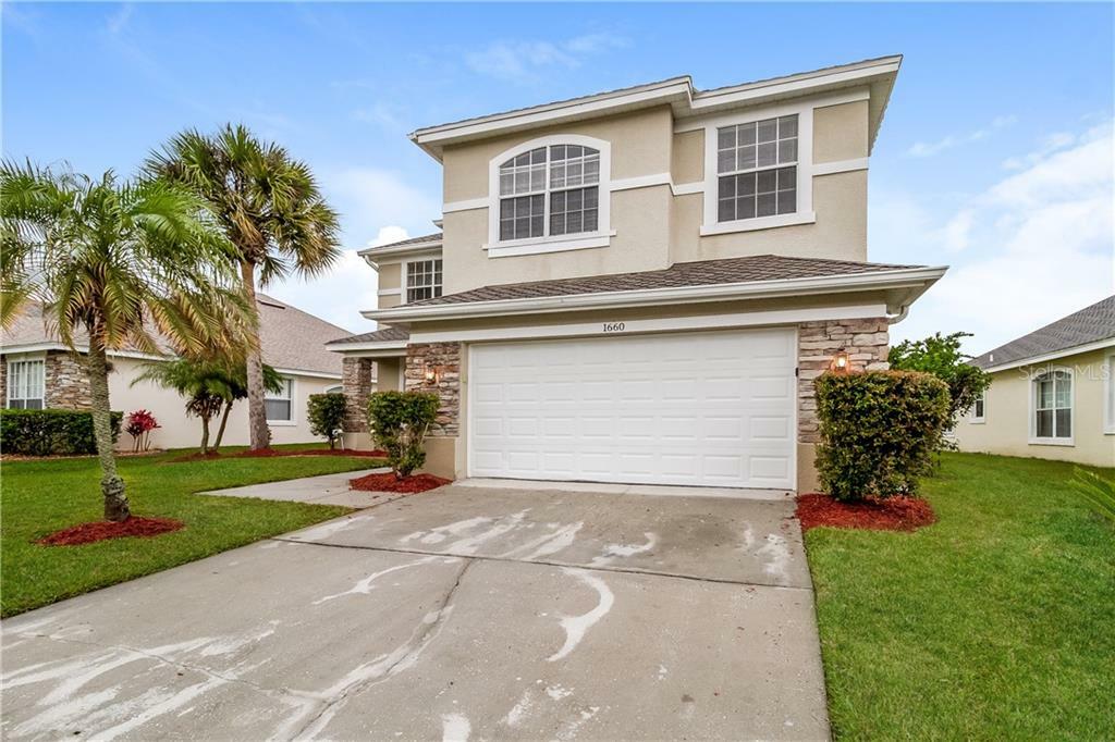 Property Photo: 1660 The Oaks Boulevard FL 34746