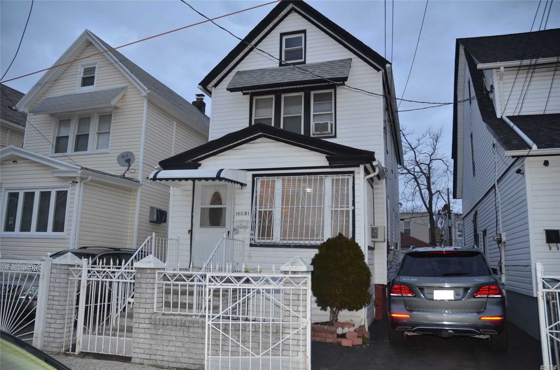 Property Photo:  104-31 122nd Street  NY 11418 