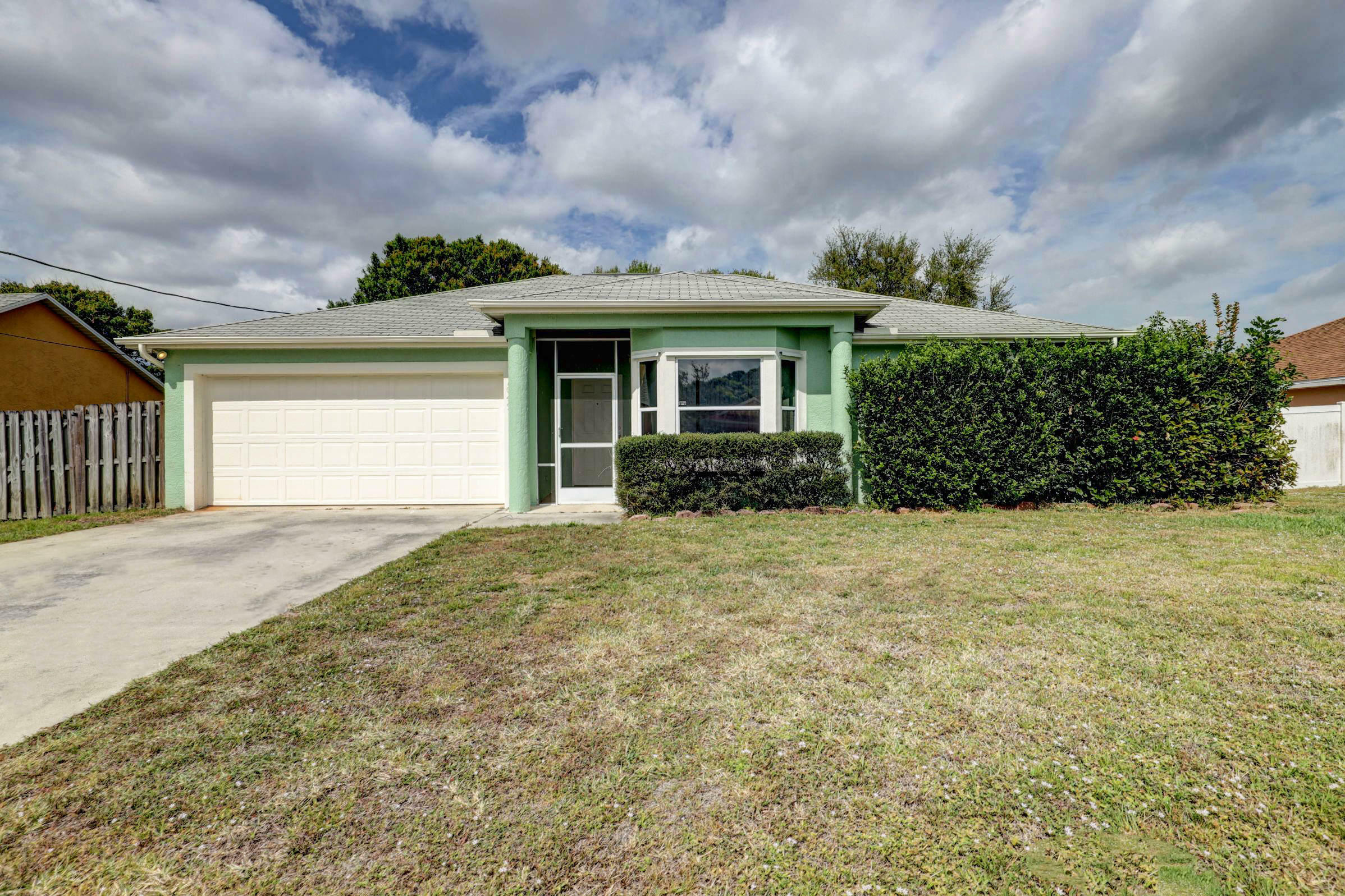 Property Photo:  1049 SW Sarto Lane  FL 34953 