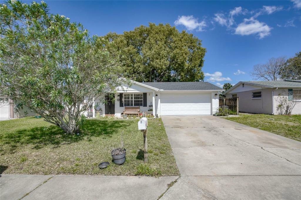 Property Photo: 7841 Halsey Drive FL 34668