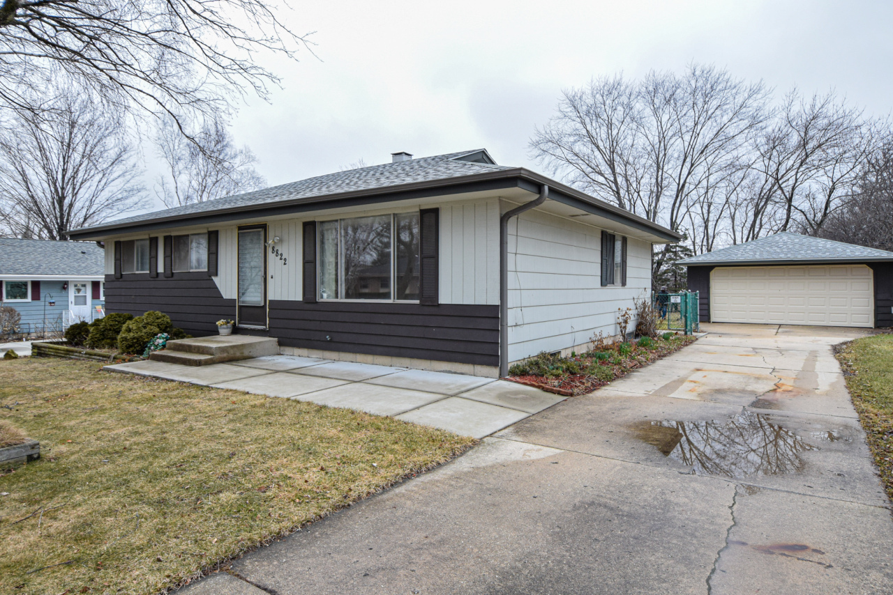 Property Photo:  8822 W Helena St  WI 53224 