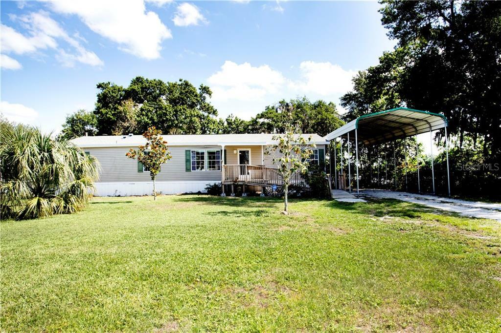 Property Photo: 10124 Kenlake Drive FL 33578