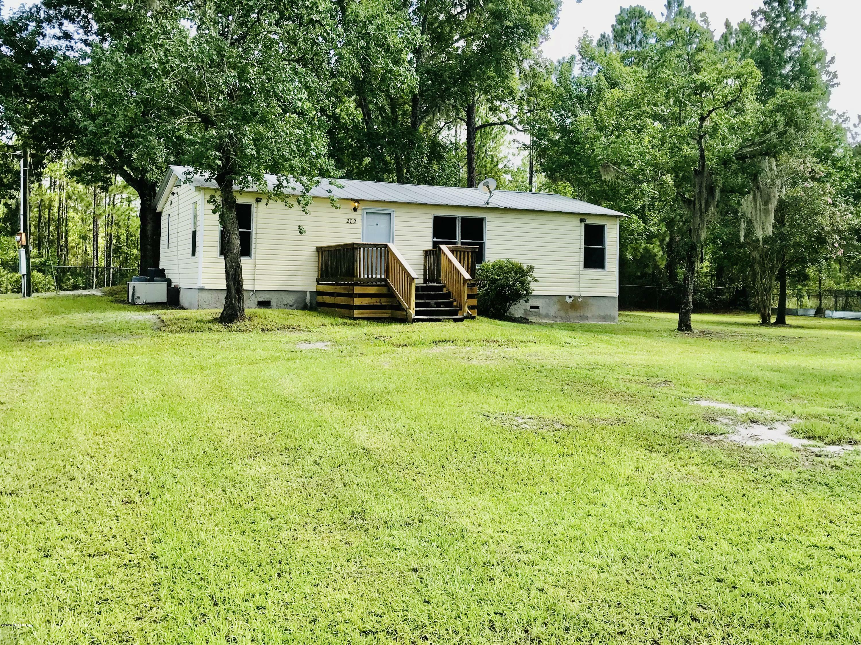 Property Photo:  202 SW 5th Avenue  FL 32177 