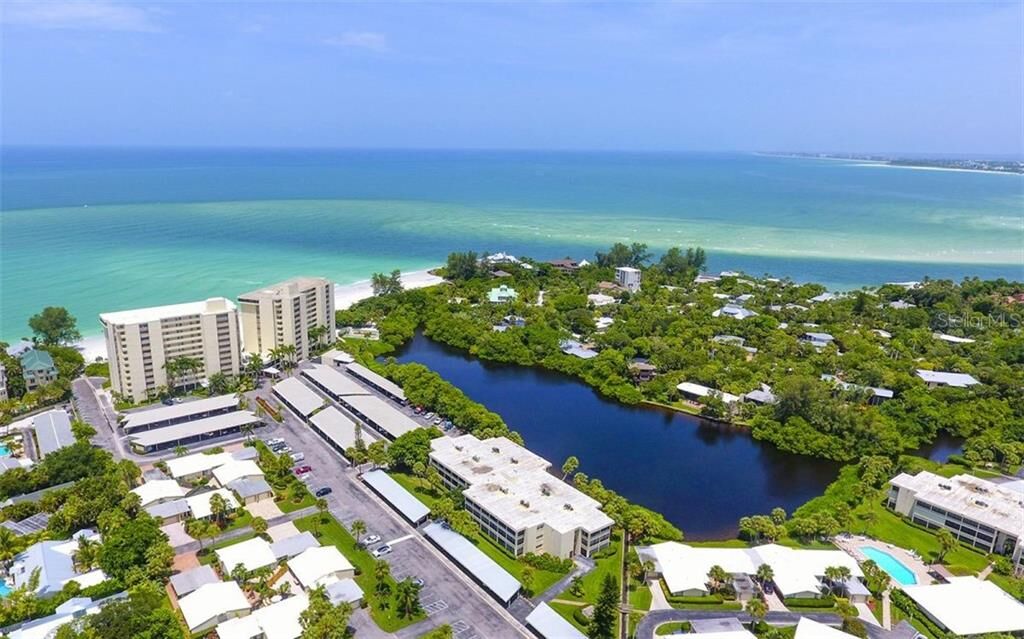 Property Photo:  101 Whispering Sands Drive 207  FL 34242 