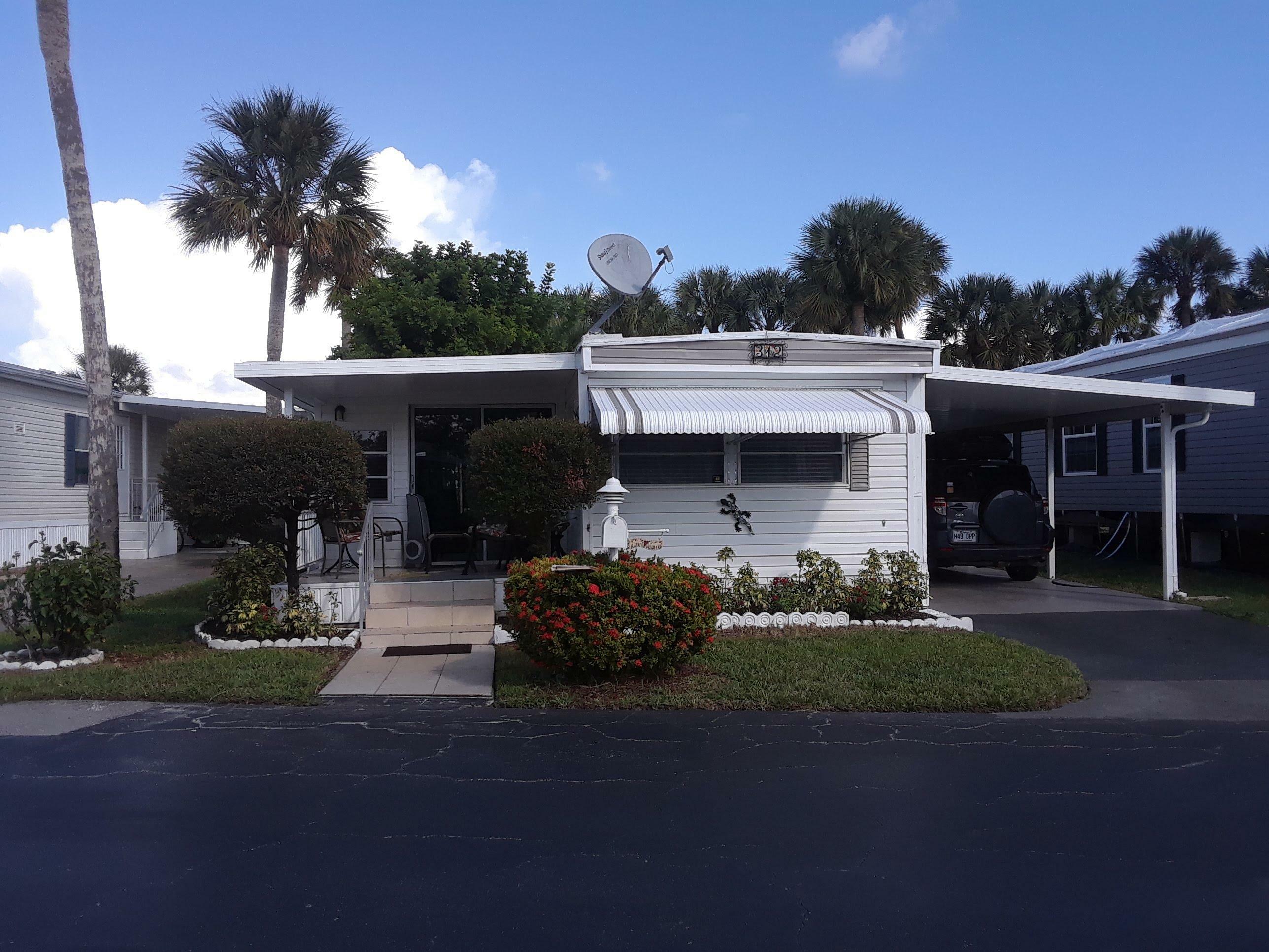 Property Photo:  312 Hibiscus Drive  FL 33442 