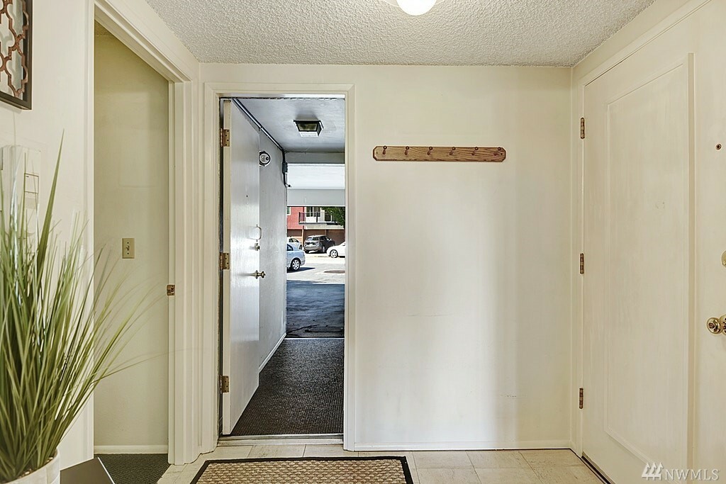 Property Photo:  3410 25th Ave W 201  WA 98199 