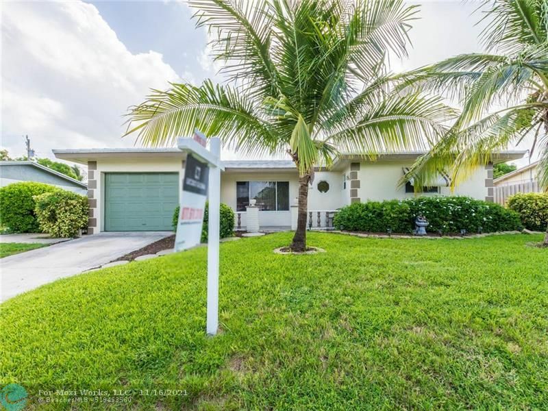 Property Photo:  1280 SW 10th Ave  FL 33441 