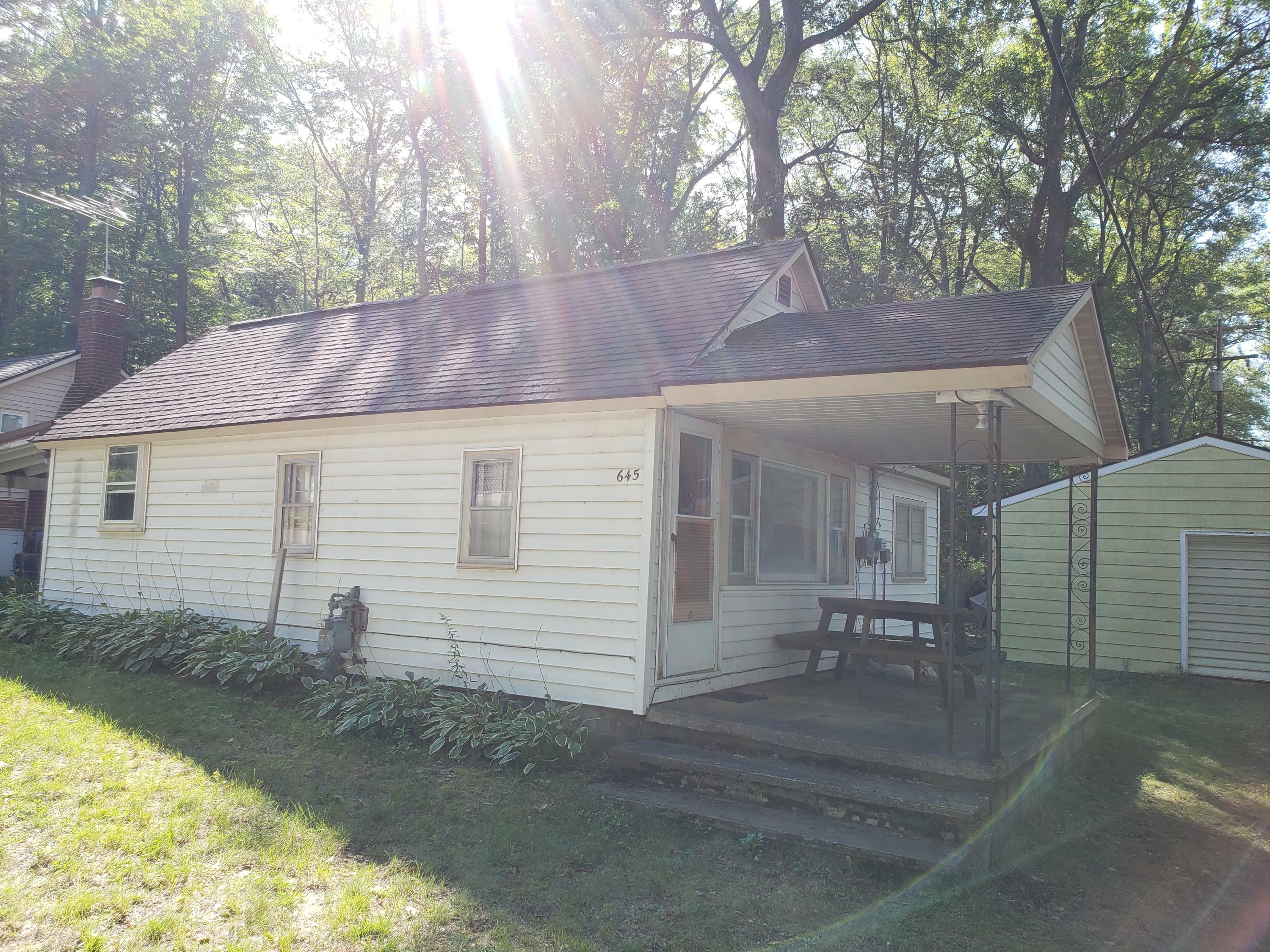 Property Photo:  645 Sharon Street  MI 49735 