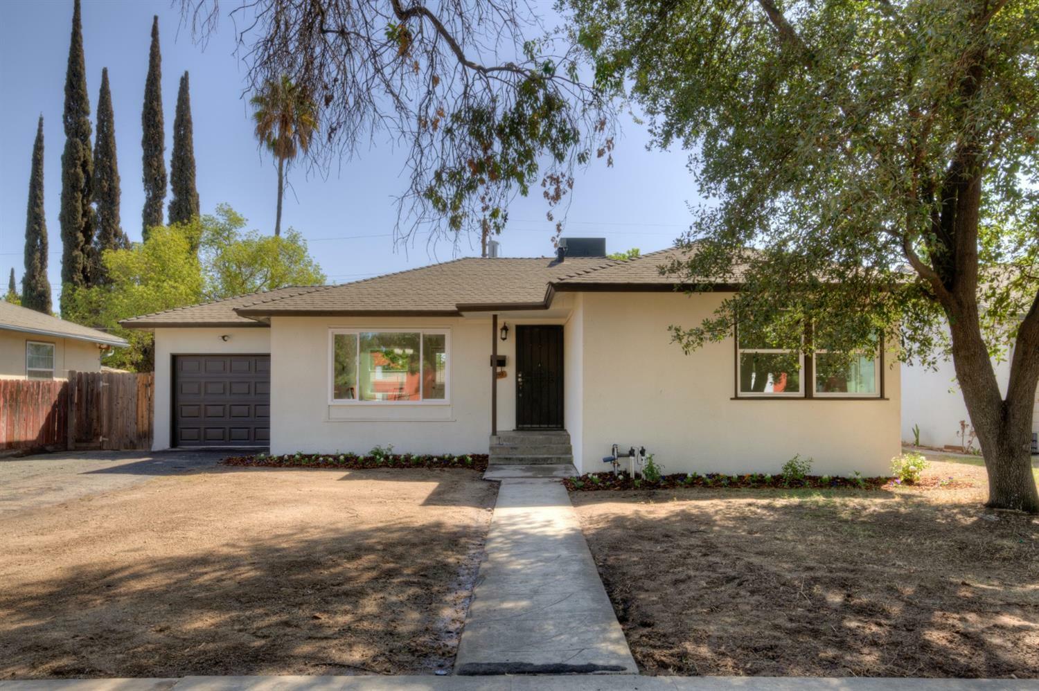 Property Photo:  945 W Griffith Way  CA 93705 