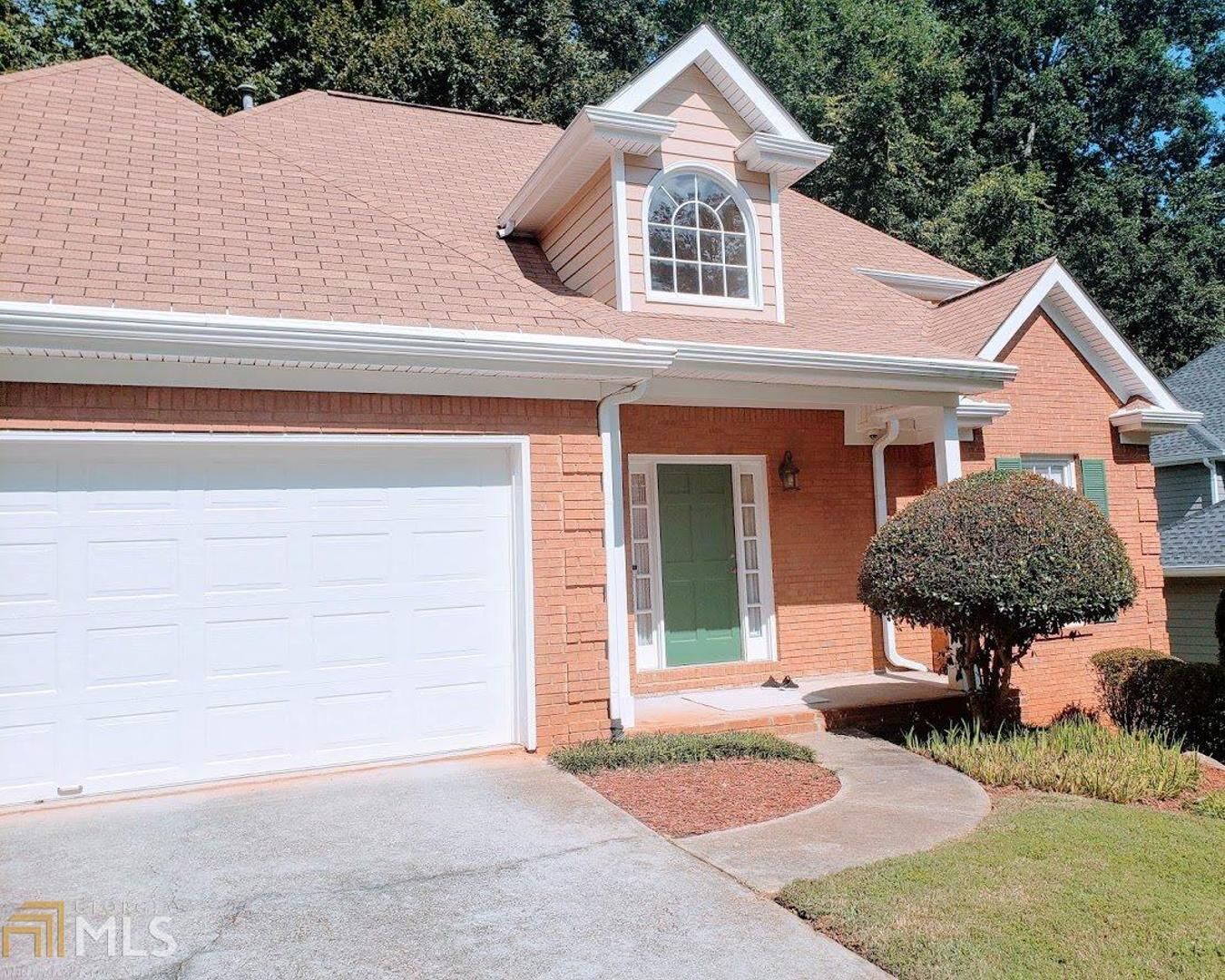 Property Photo: 7036 Wind Run Way GA 30087