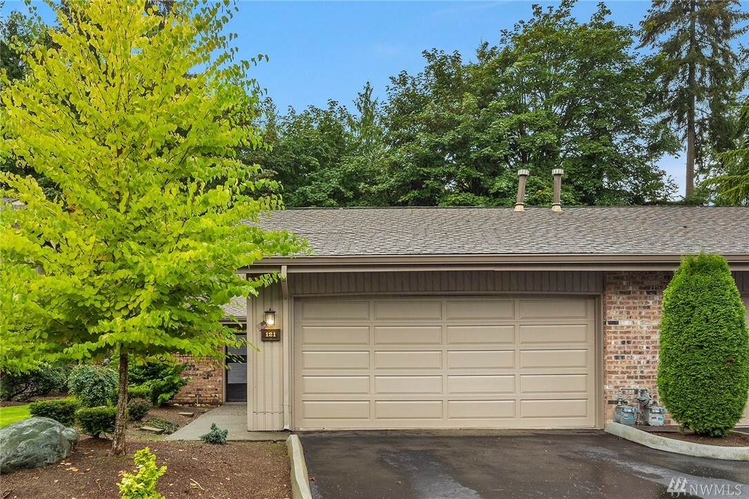 Property Photo:  121 140th Place NE 132K  WA 98007 