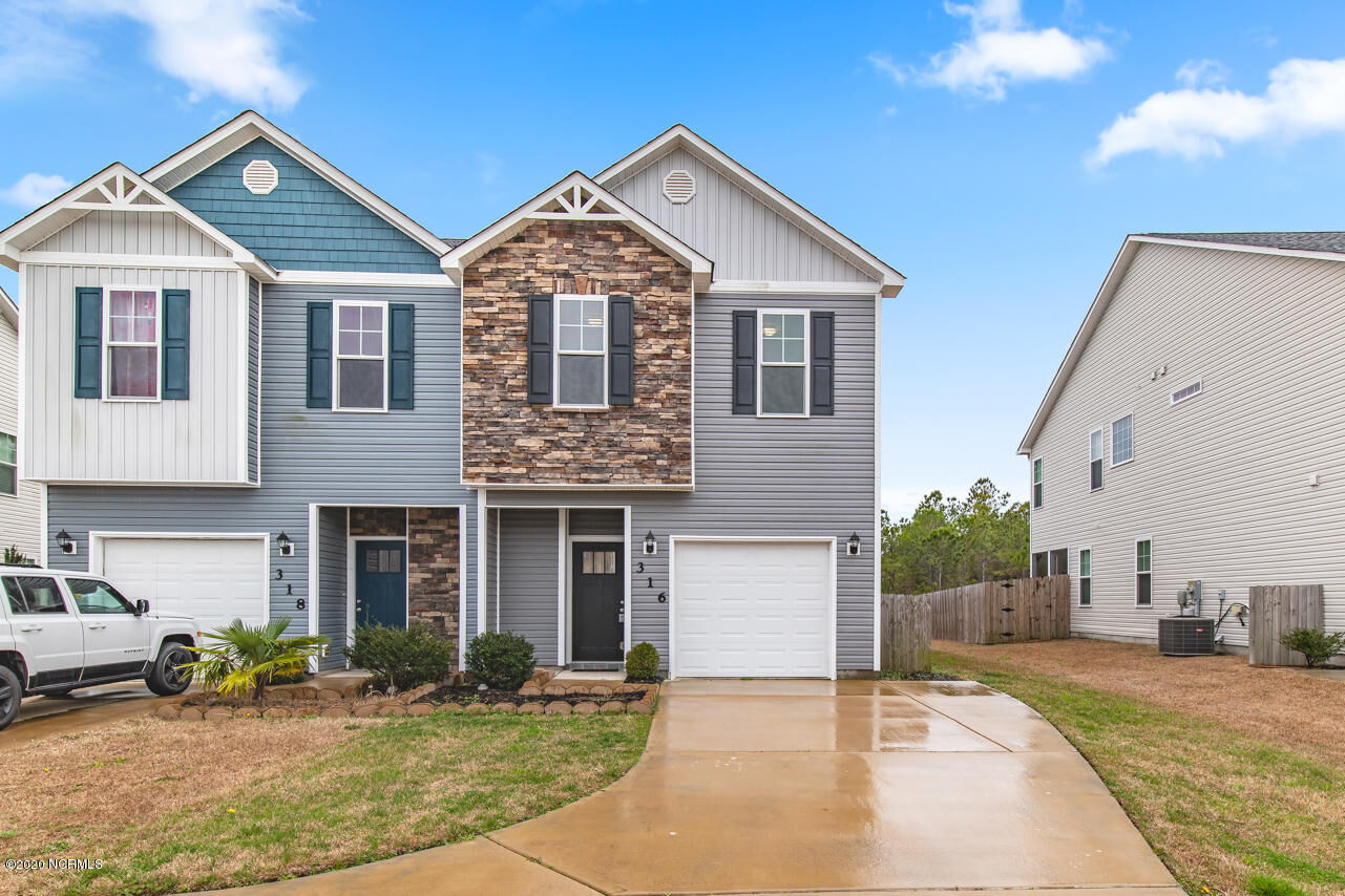 Property Photo:  316 Frisco Way  NC 28445 