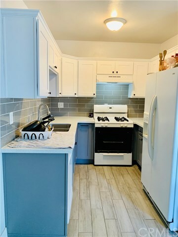 Property Photo:  1036 Magnolia Avenue 206  CA 90247 