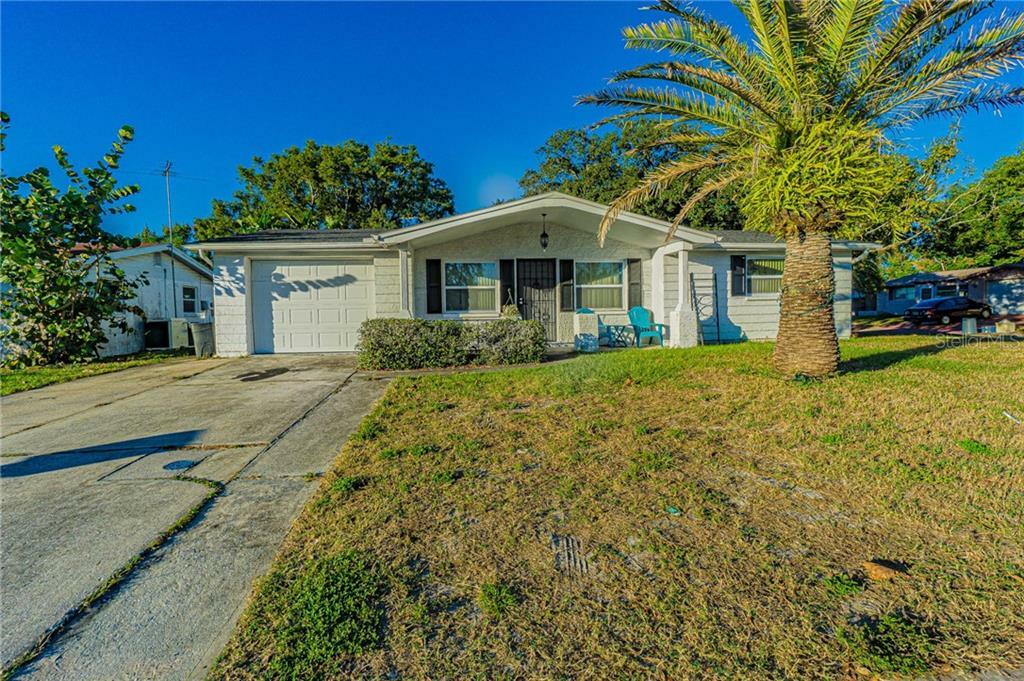 Property Photo:  7835 Burnham Drive  FL 34668 