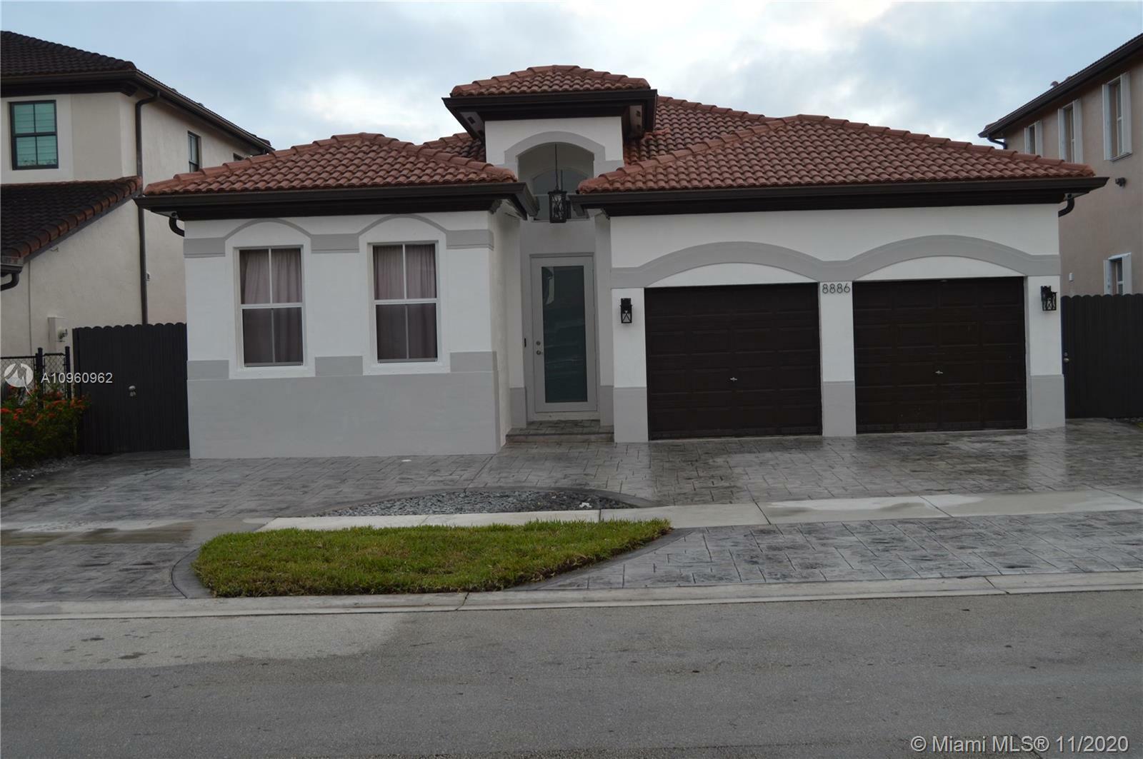 Property Photo: 8886 NW 184th St FL 33018