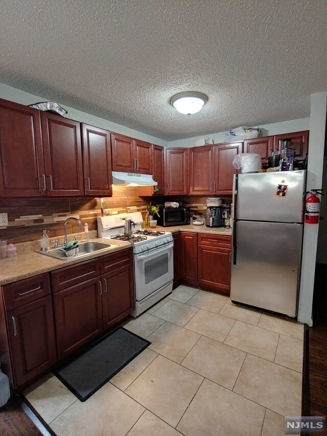 Property Photo:  23-27 Holsman Street  NJ 07522 