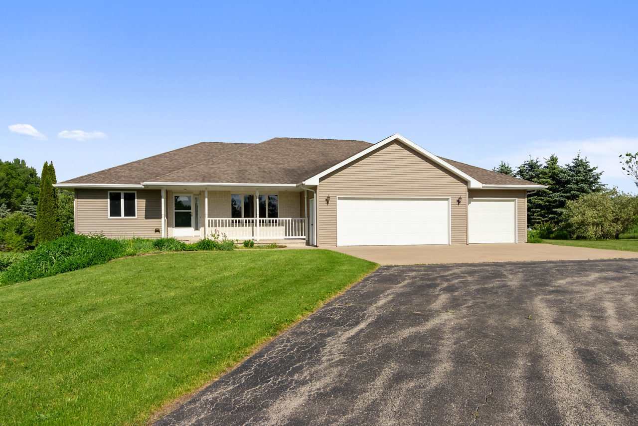 Property Photo:  W3263 Hofa Park Road  WI 54162-8476 