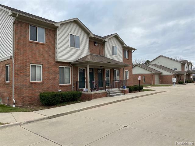 Property Photo: 18530 E 14 Mile Rd Apt 1,3,6,7,8 MI 48026