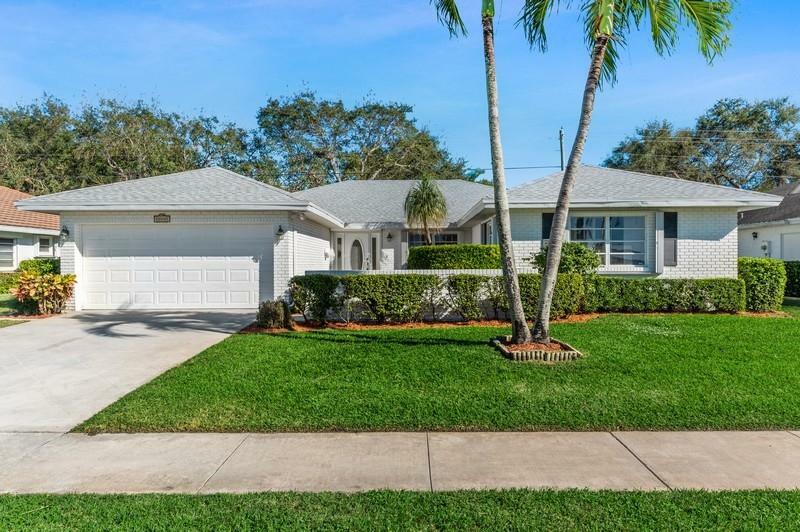 Property Photo:  10808 Greentrail Drive South  FL 33436 