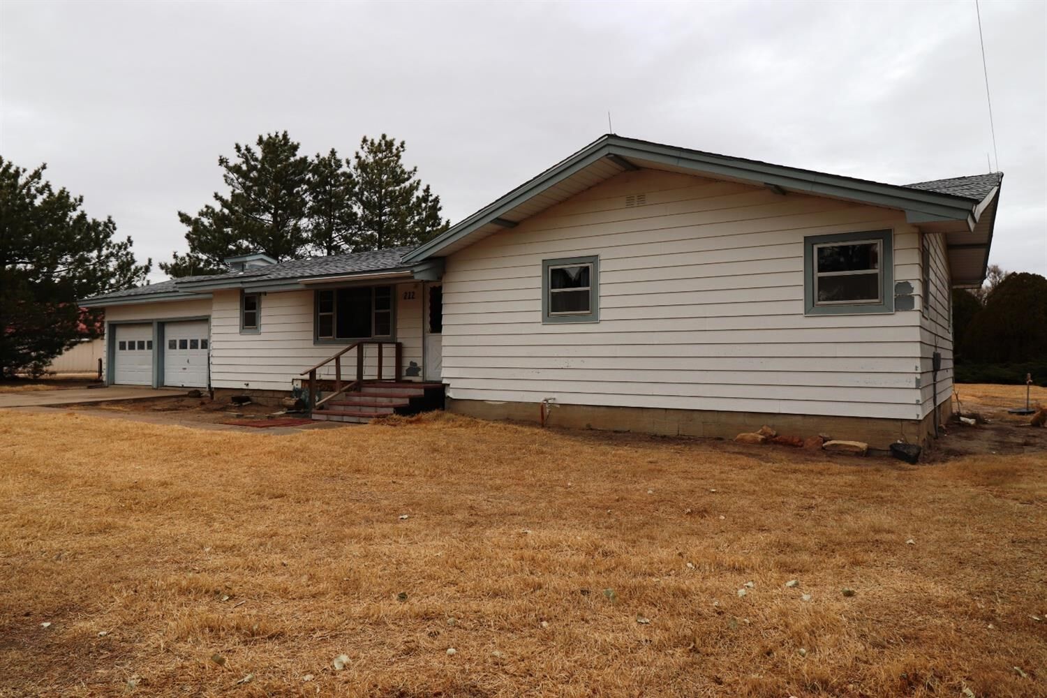 Property Photo: 212 W Kansas KS 67853