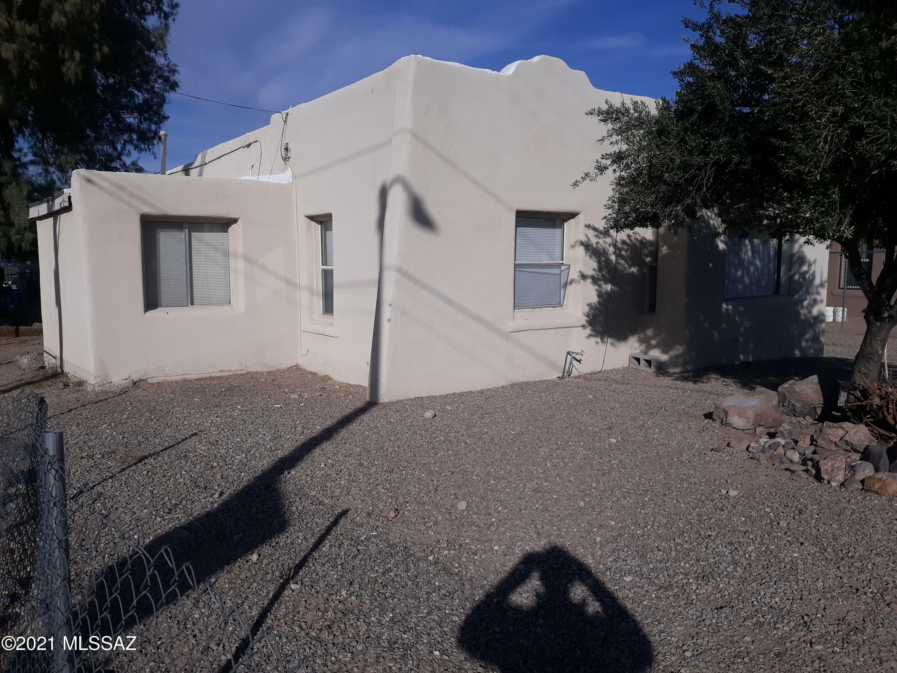 Property Photo:  126 W Veterans Boulevard  AZ 85713 