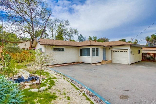 Property Photo:  9026 Winter Gardens Blvd  CA 92040 