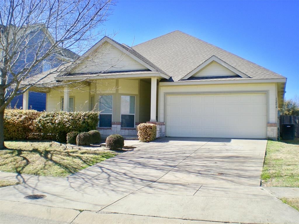Property Photo: 1204 Whisper Willow Drive TX 75072