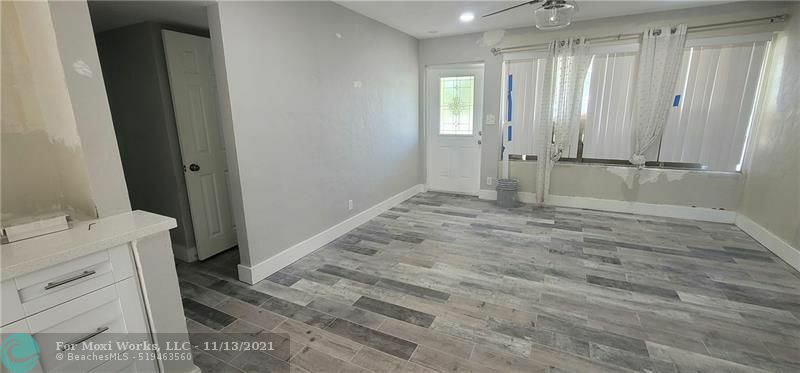 Property Photo:  1100 NE 3rd St  FL 33060 