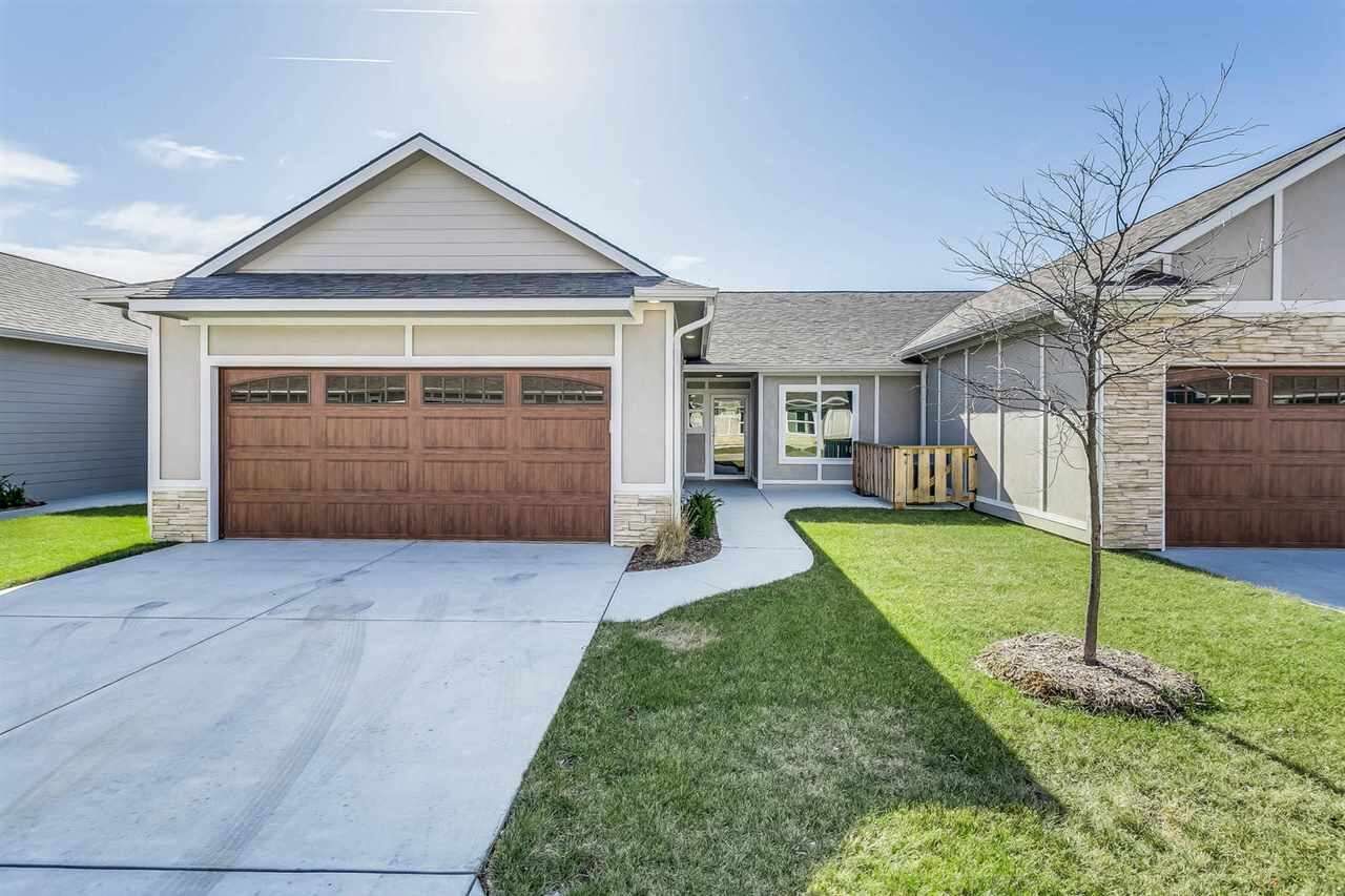 Property Photo: 2418 E Madison Villa 1803 KS 67037