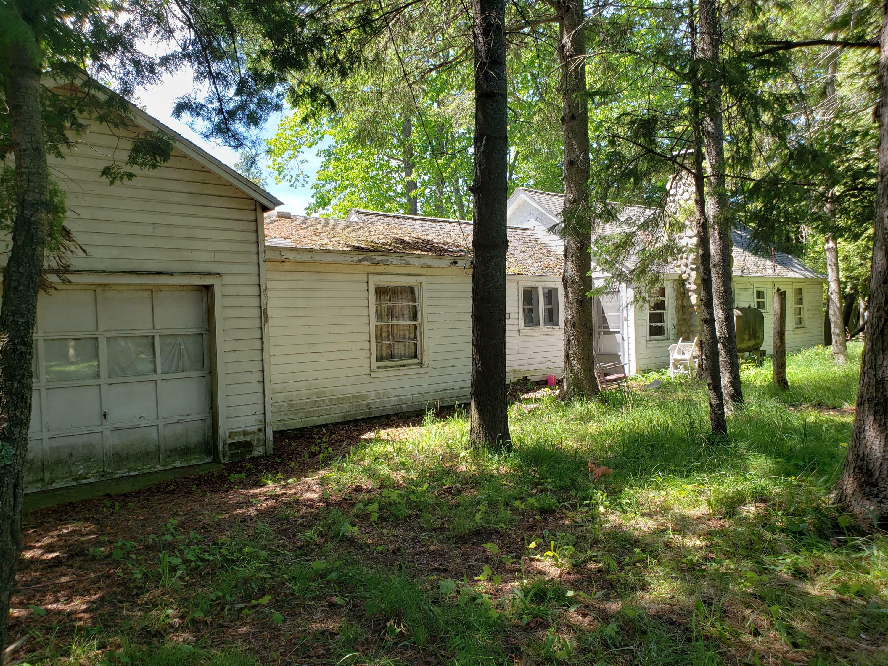 Property Photo:  4639 E Burt Lake Road (Also 4657)  MI 49721 