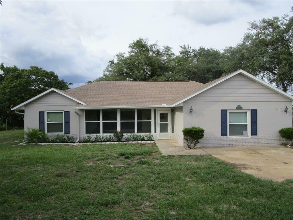 Property Photo:  10930 Turnpike Road  FL 34715 